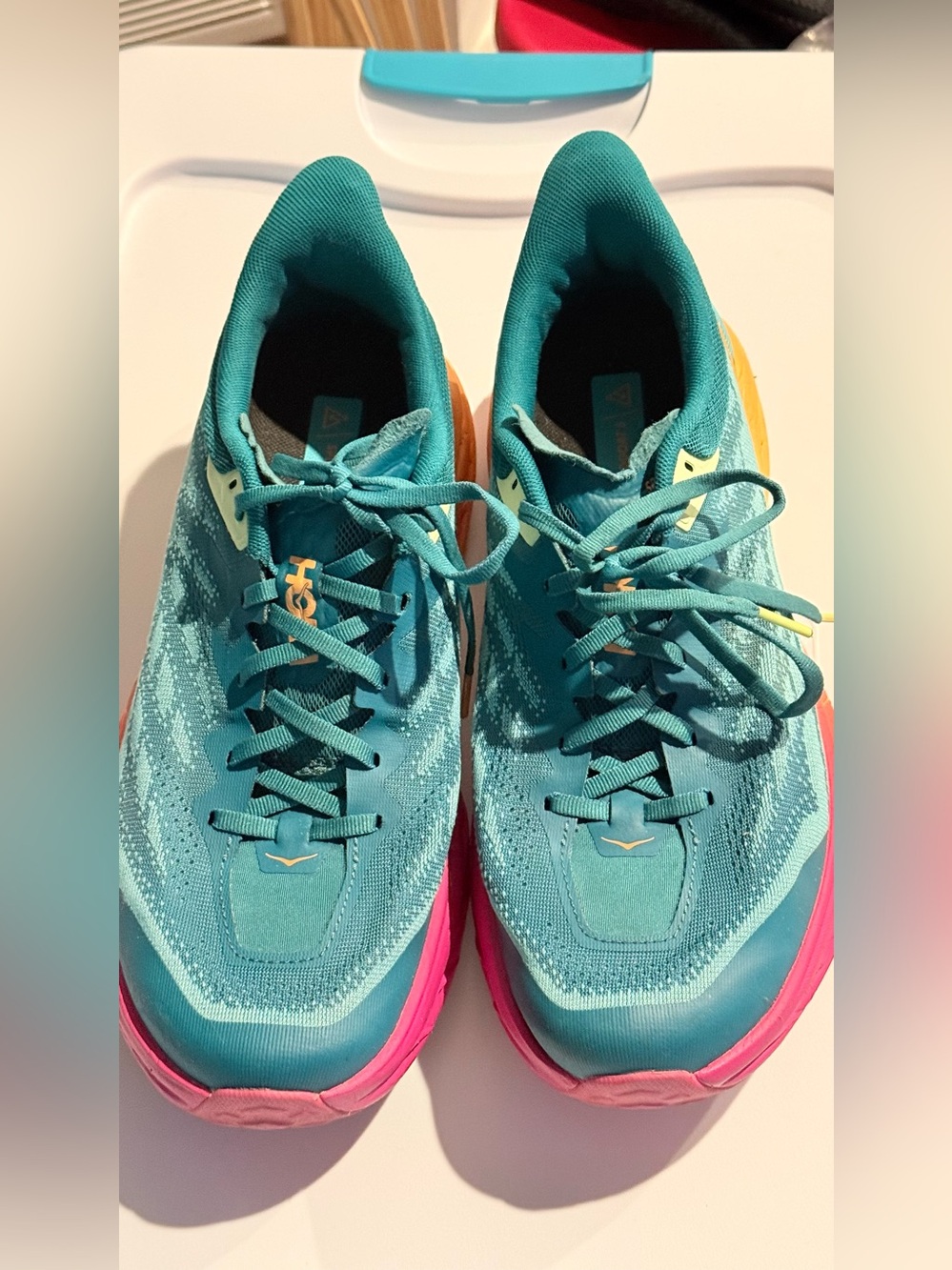 Men’s 10.5 Teal Running Shoes with Pink Sole